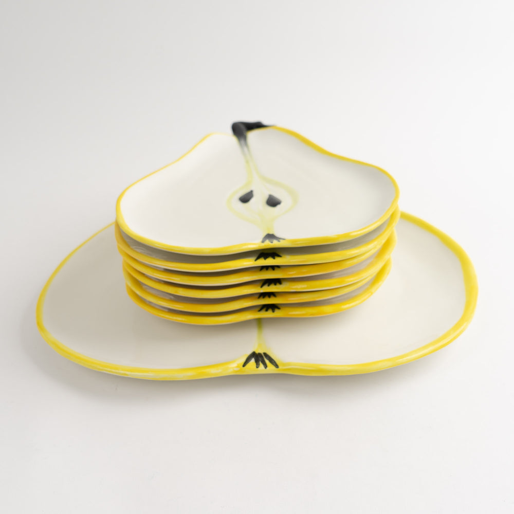 
                  
                    Set of seven vintage hand-painted pear-shaped ceramic plates designed by Ernestine Cannon and made in Salerno, Italy
                  
                