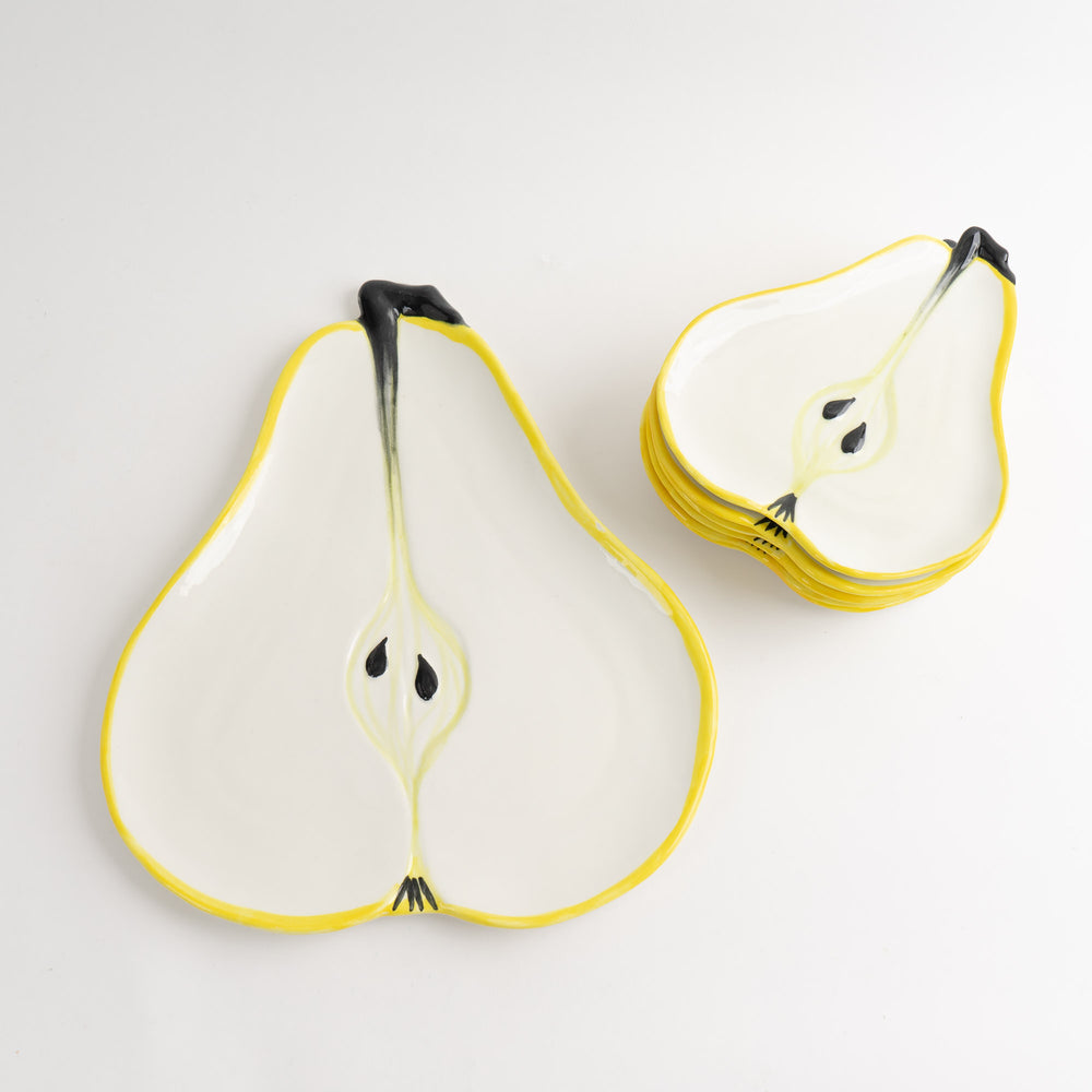 
                  
                    Set of seven vintage hand-painted pear-shaped ceramic plates designed by Ernestine Cannon and made in Salerno, Italy
                  
                