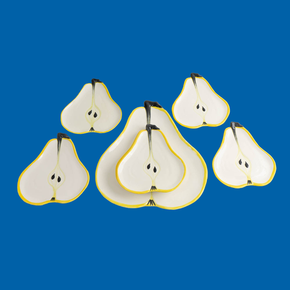 
                  
                    Set of seven vintage hand-painted pear-shaped ceramic plates designed by Ernestine Cannon and made in Salerno, Italy
                  
                