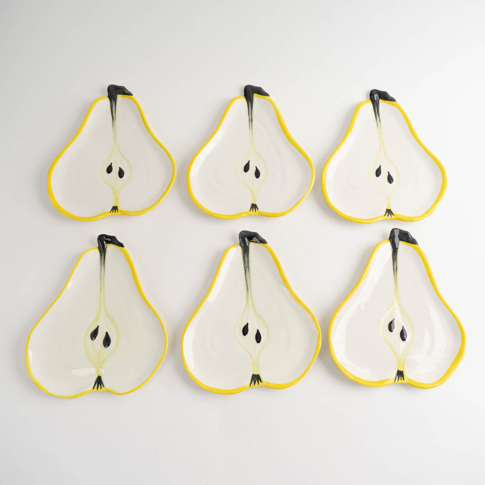 
                  
                    Set of seven vintage hand-painted pear-shaped ceramic plates designed by Ernestine Cannon and made in Salerno, Italy
                  
                