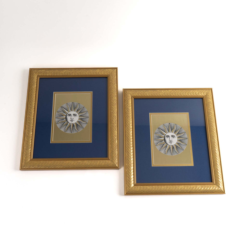 
                  
                    Pair of vintage Fornasetti Soli (sun) prints in gold frames with blue matting and metallic gold sun details
                  
                