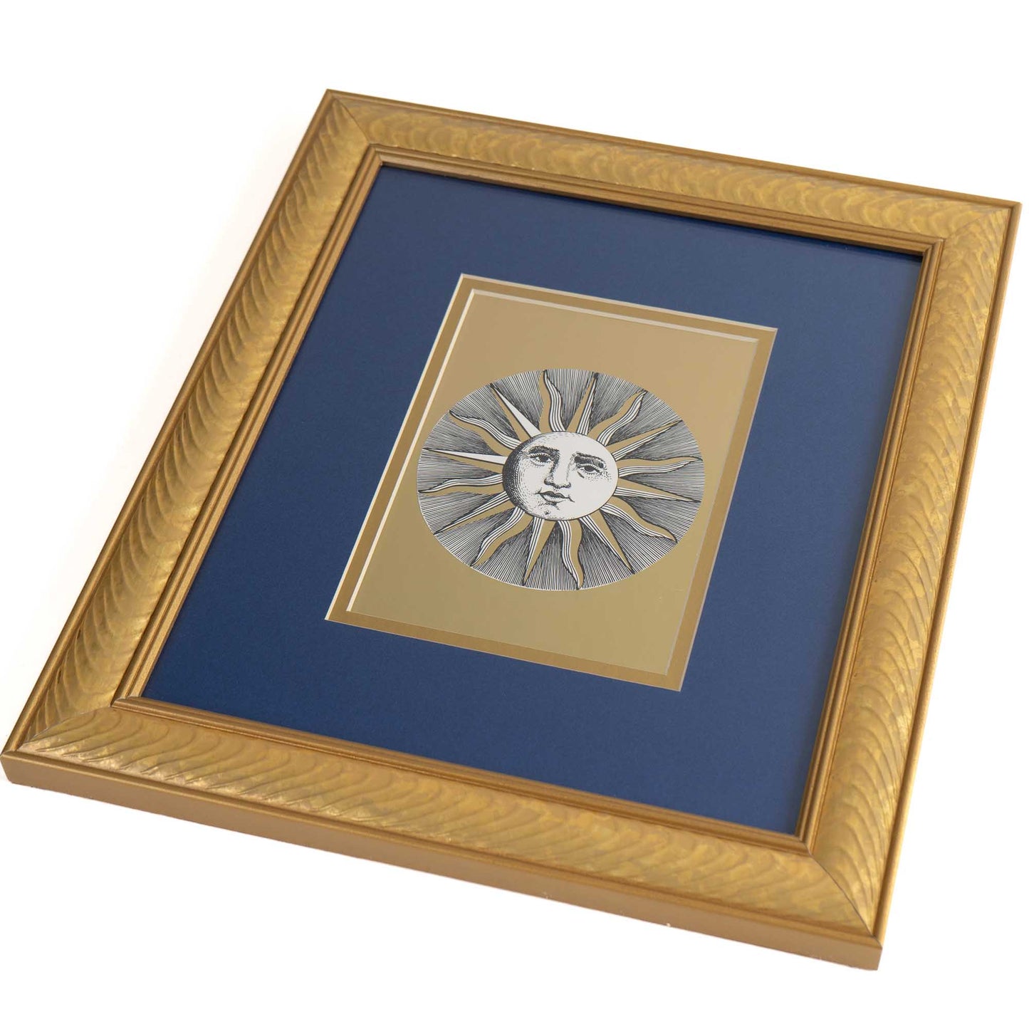vintage Fornasetti Soli (sun) prints in gold frames with blue matting and metallic gold sun details
