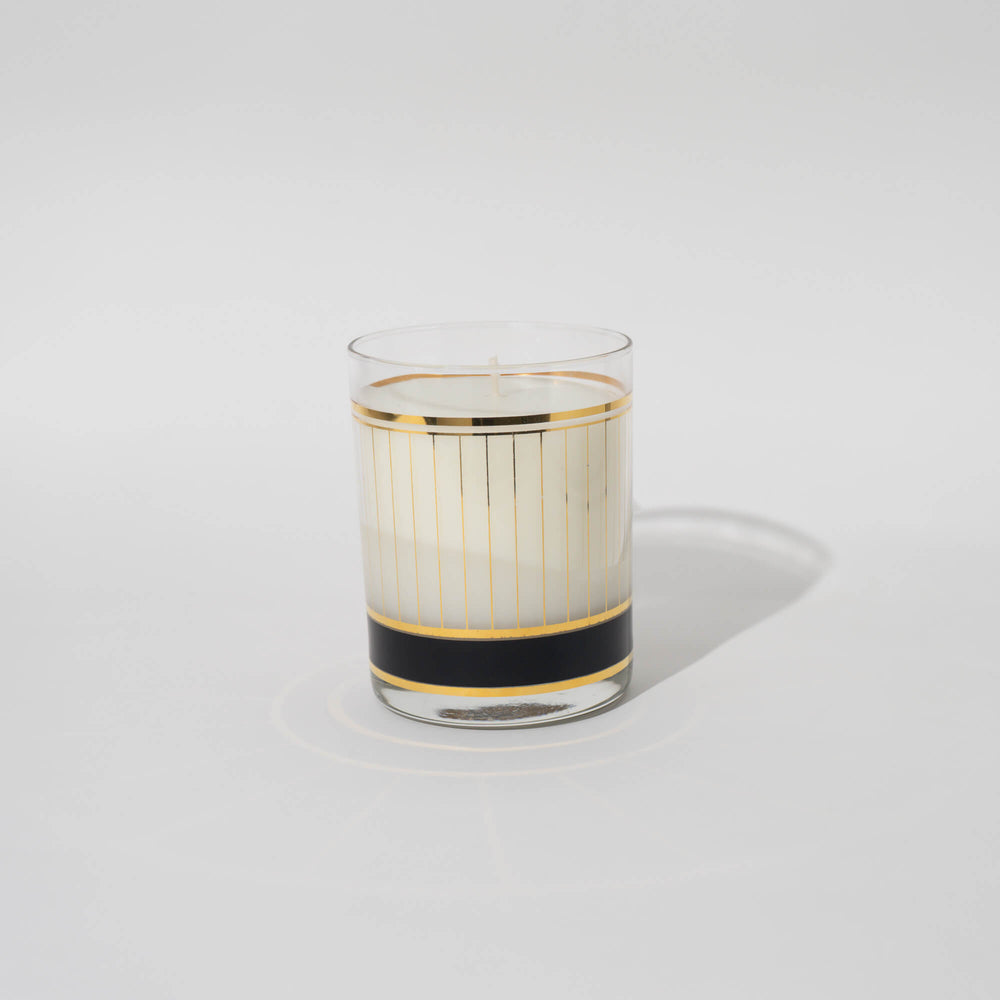
                  
                    Luxury hand-poured scented candle in vintage gold and black Culver glass.  
                  
                