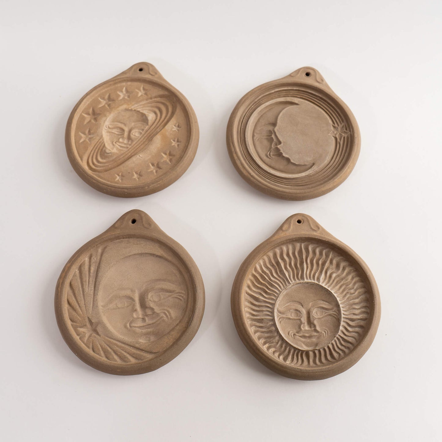Load image into Gallery viewer, Vintage Hartstone Celestial Cookie Molds - Set of 4 - Sun and Moons - Saturn and Stars
