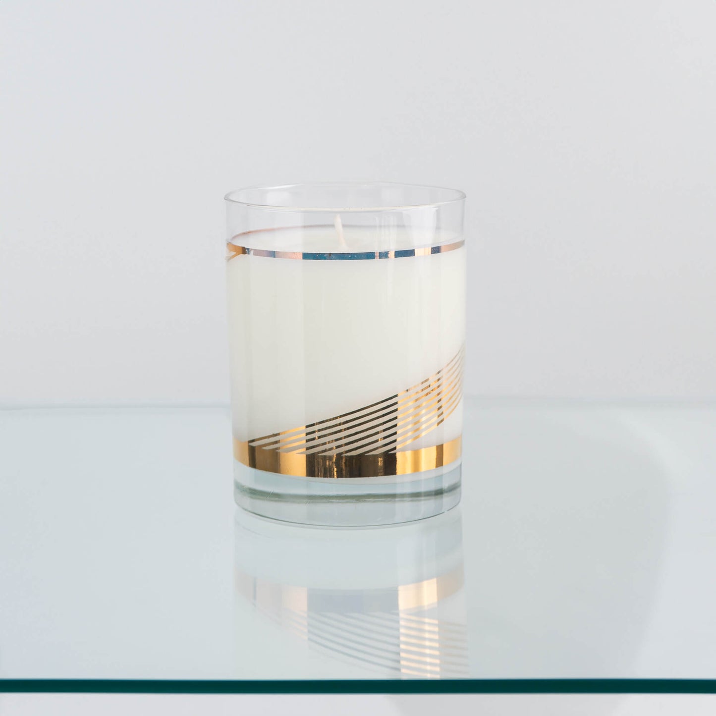 Load image into Gallery viewer, Mid century old fashioned gold striped glass barware candle
