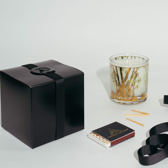 Load image into Gallery viewer, Vintage Bamboo Glass Candle with elegant black gift box with a wax seal and ribbon
