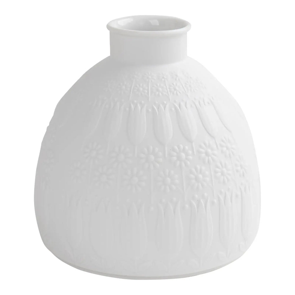 
                  
                    Vintage white porcelain vase with tulip and daisy relief design by Nanny Still for Heinrich & Co, Model #1904, made in Selb, Bavaria, Germany.
                  
                