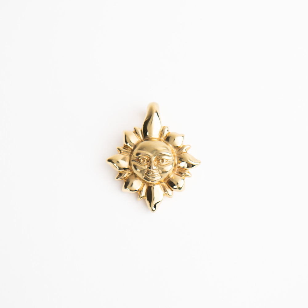 
                  
                    vintage 14k gold puffy smiling cosmic sun pendant 
                  
                