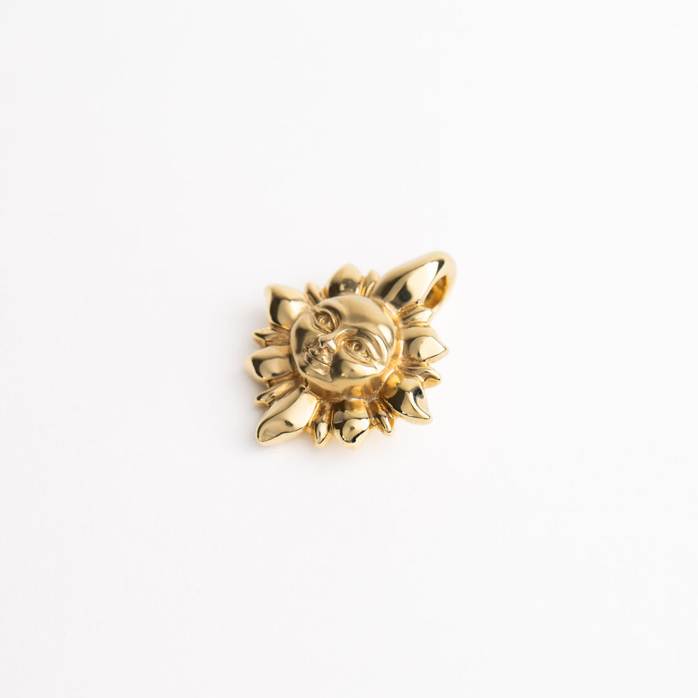 
                  
                    vintage 14k gold puffy smiling cosmic sun pendant 
                  
                