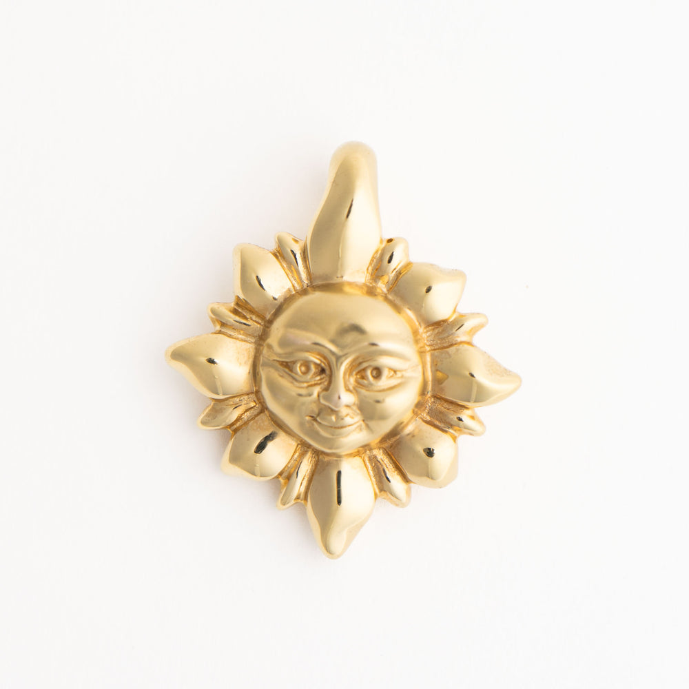 
                  
                    vintage 14k gold puffy smiling sun pendant close up 
                  
                