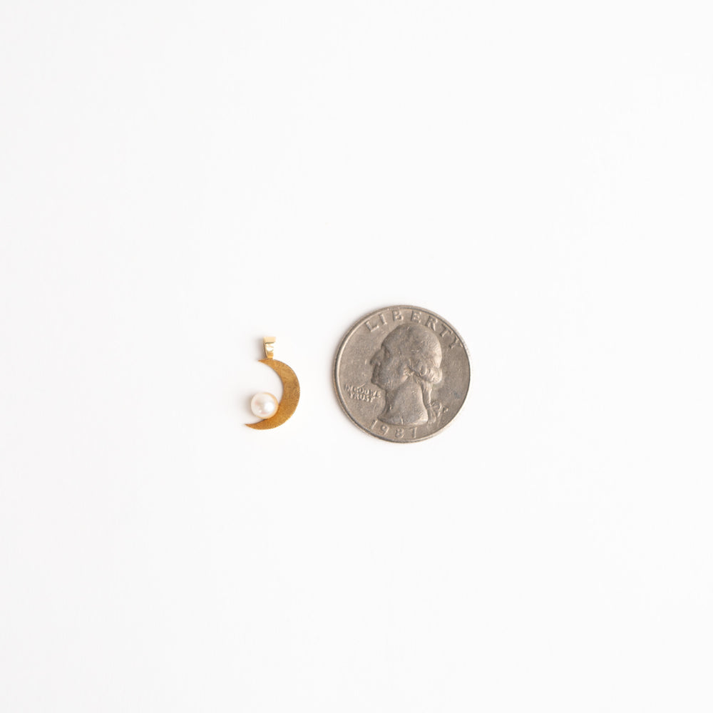 
                  
                    vintage 14k gold crescent moon charm with round pearl accent
                  
                