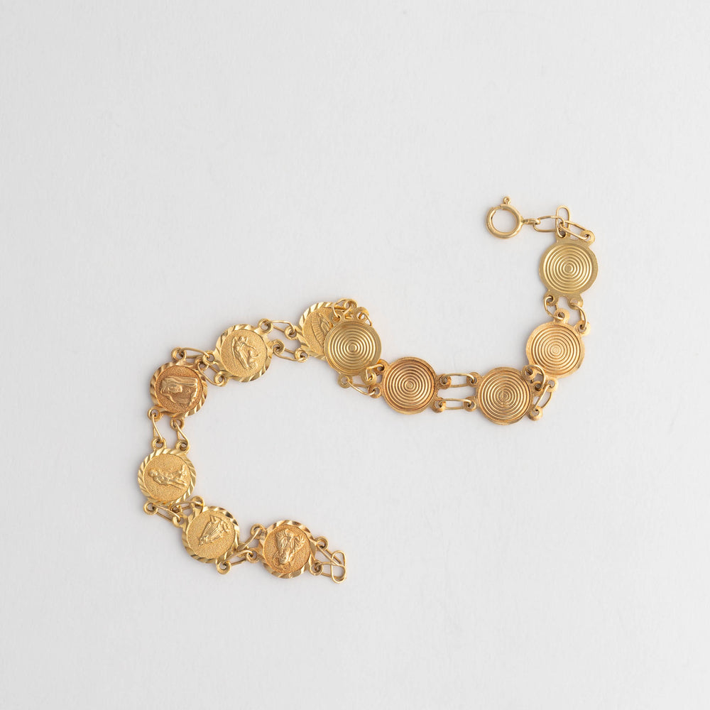 
                  
                     vintage 14k gold catholic saints medallion bracelet

                  
                