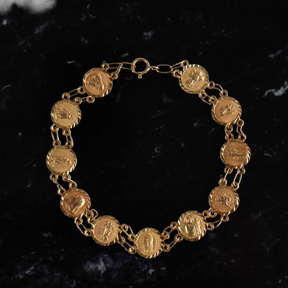 
                  
                     vintage 14k gold catholic saints charm medallion bracelet

                  
                