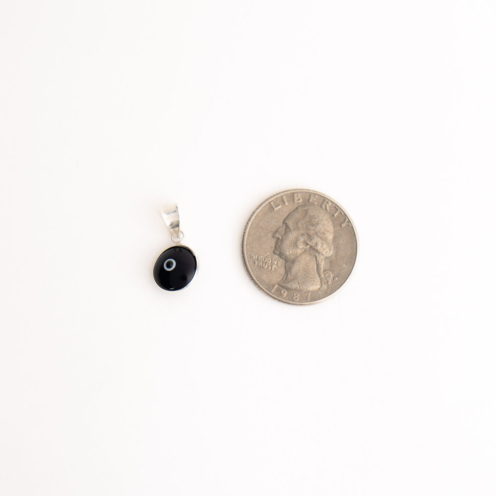 
                  
                    protective evil eye charm in black with sterling silver
                  
                