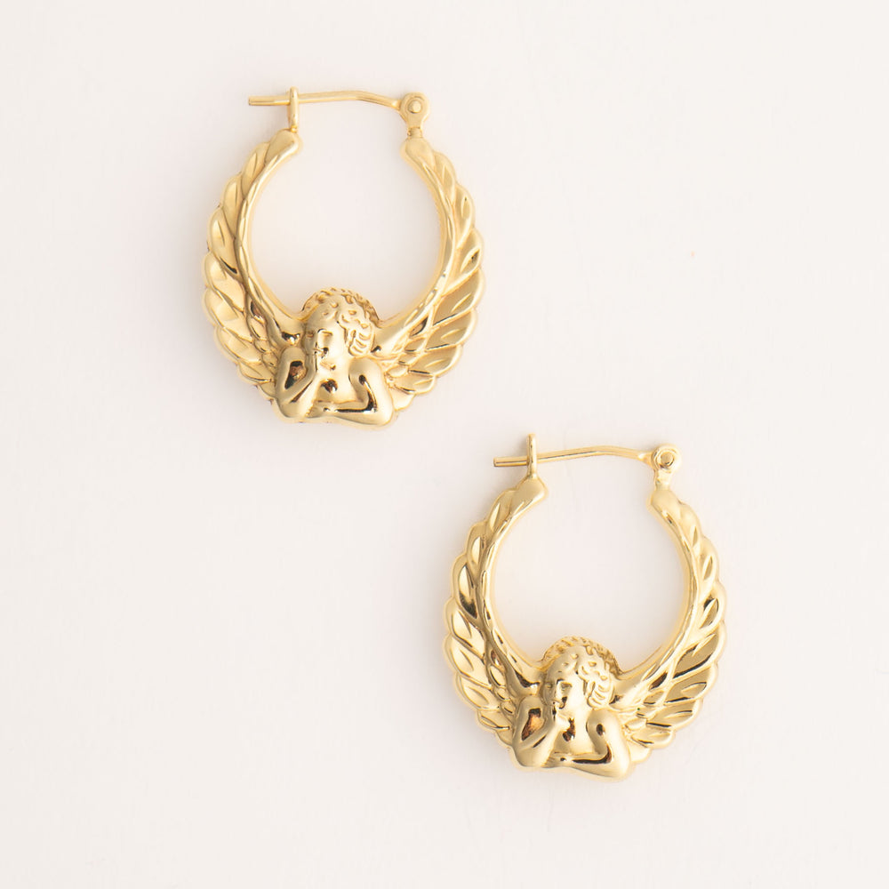 
                  
                    vintage 14k gold fiorucci style angel hoop earrings 90s 
                  
                