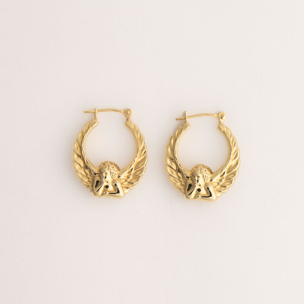 
                  
                    vintage 14k gold fiorucci style angel hoop earrings
                  
                