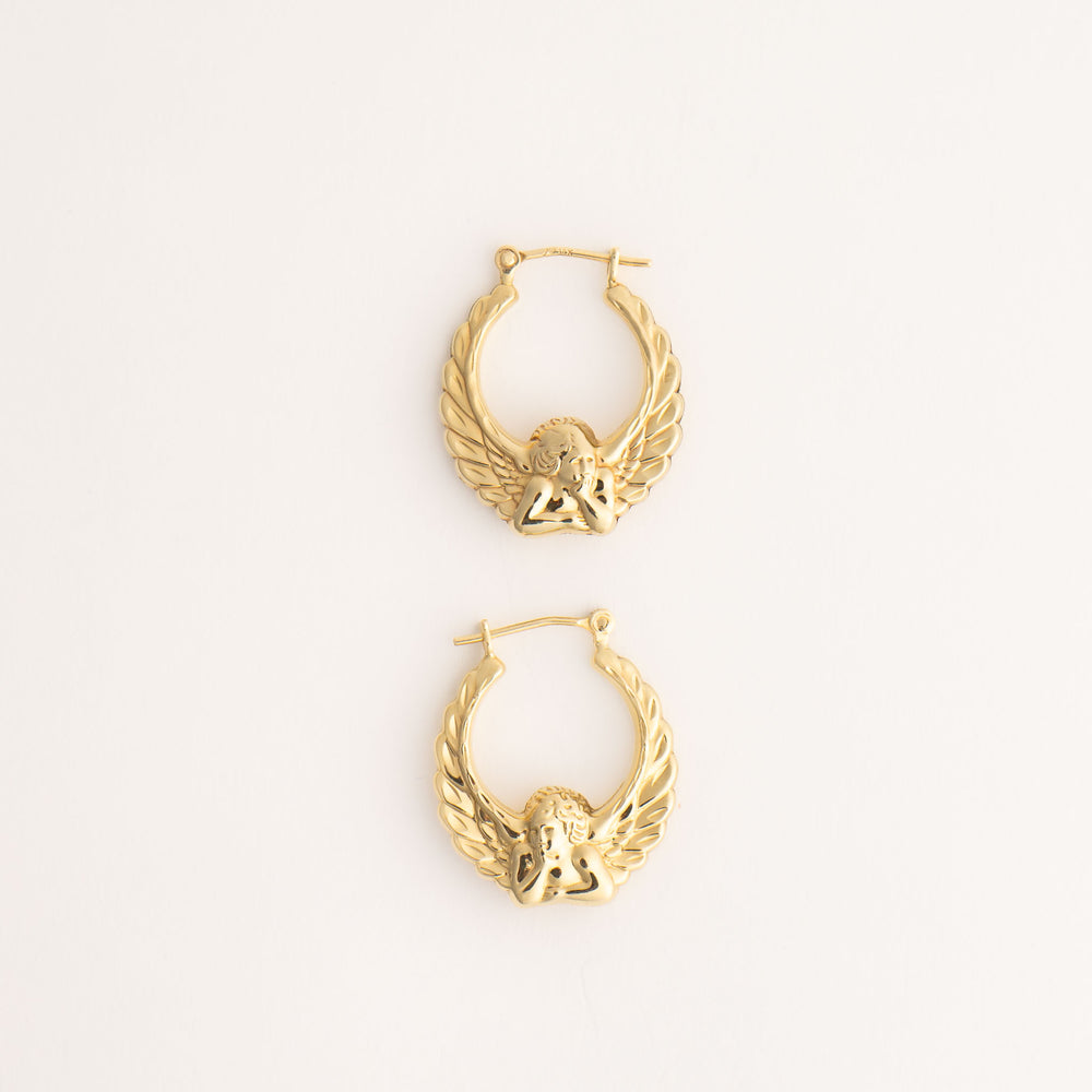 
                  
                    vintage 14k gold fiorucci style angel hoop earrings
                  
                