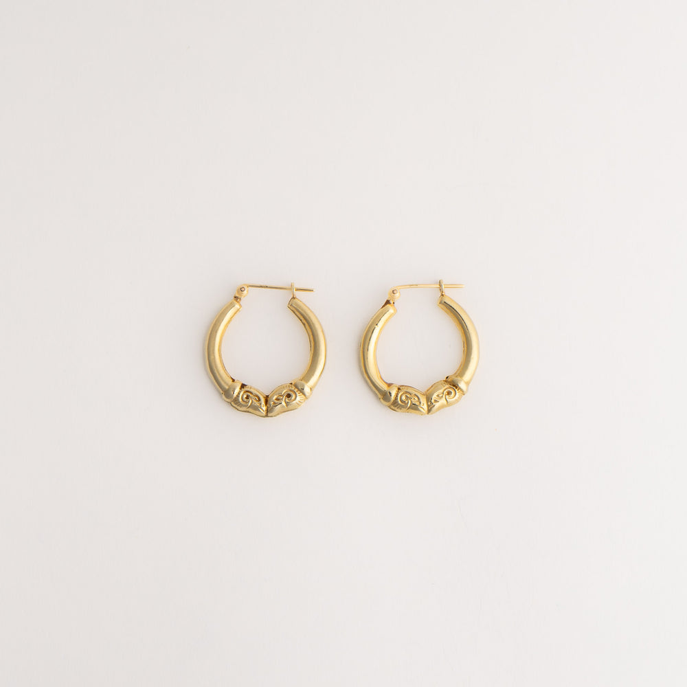 
                  
                    vintage 14k gold double ram head hoop aries earrings
                  
                