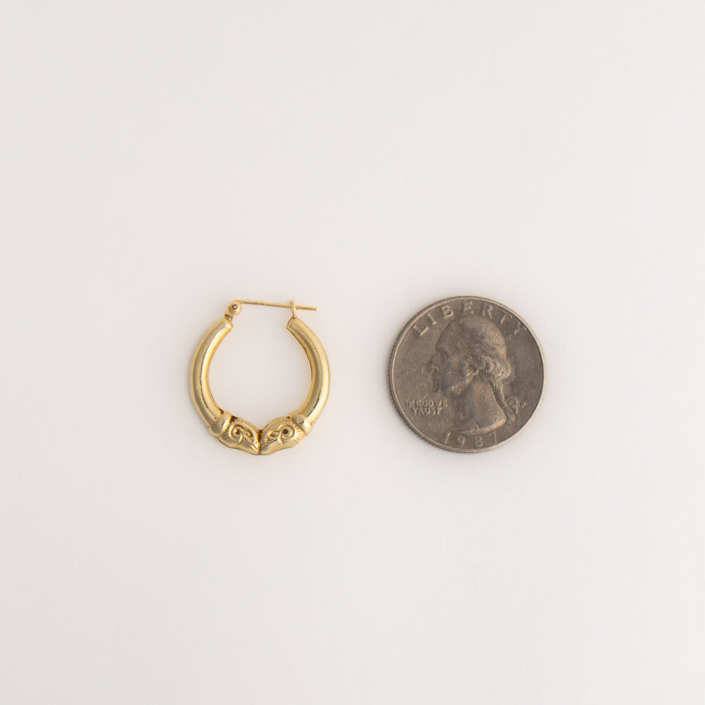 
                  
                    vintage 14k gold ram's head hoop earrings
                  
                