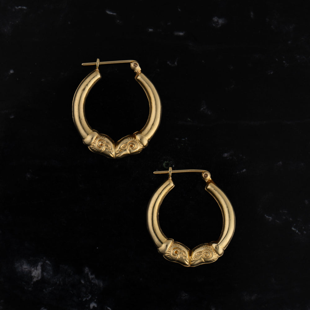 
                  
                    vintage 14k gold double ram head hoop earrings
                  
                
