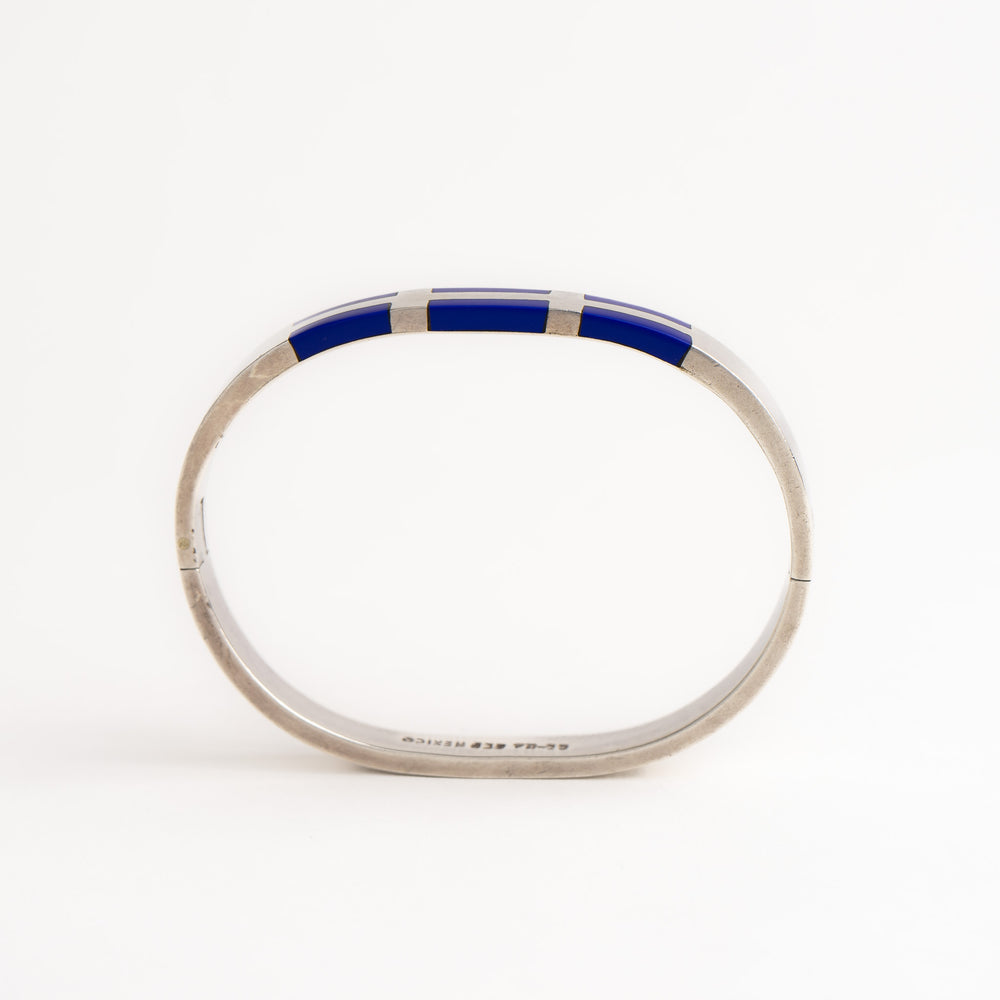 
                  
                    vintage mexican sterling silver and lapis lazuli hinged cuff bracelet
                  
                