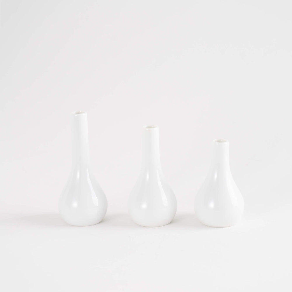 
                      
                        Vintage White Porcelain Fitz and Floyd Bud Vases - Set of 3
                      
                    