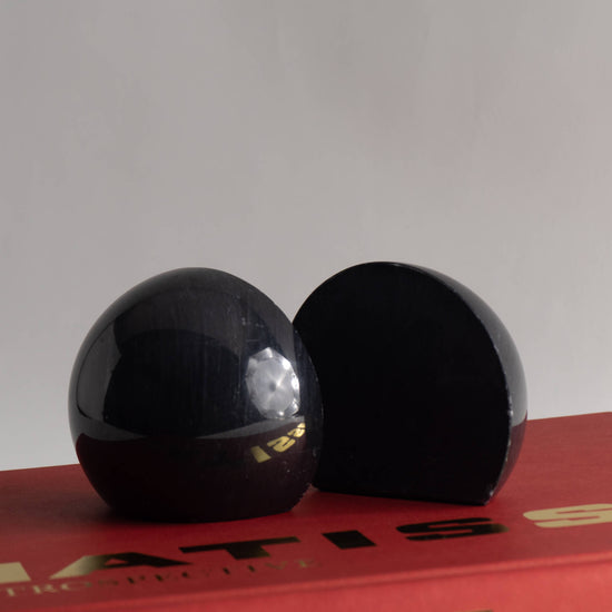 Load image into Gallery viewer, Vintage Black Marble Sphere Bookends
